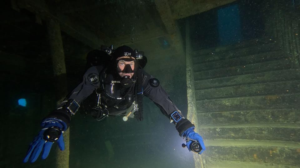 A CCR diver at the foot of the staircase inside the MV Karwela wreck, Gozo